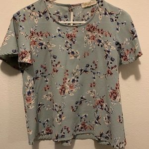 Women’s light blue floral blouse